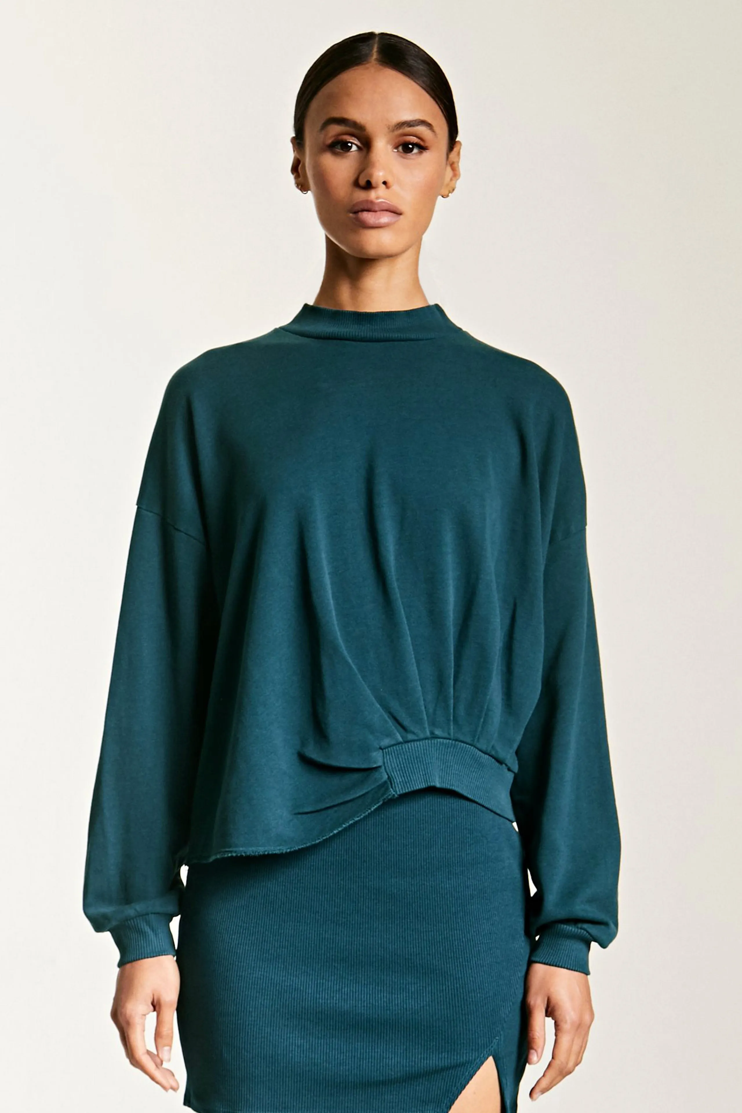 ASYMMETRICAL HEM TURTLENECK